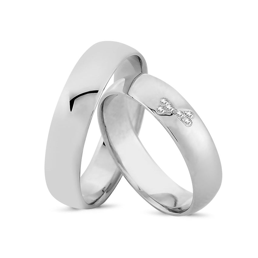 Eksklusive Nuran vielsesringe i 14 karat hvidguld med diamant i hjerteform fra Smykkecenter – blank finish, 5 mm bredde.
